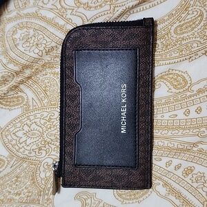 Michael Kors monogram zip wallet